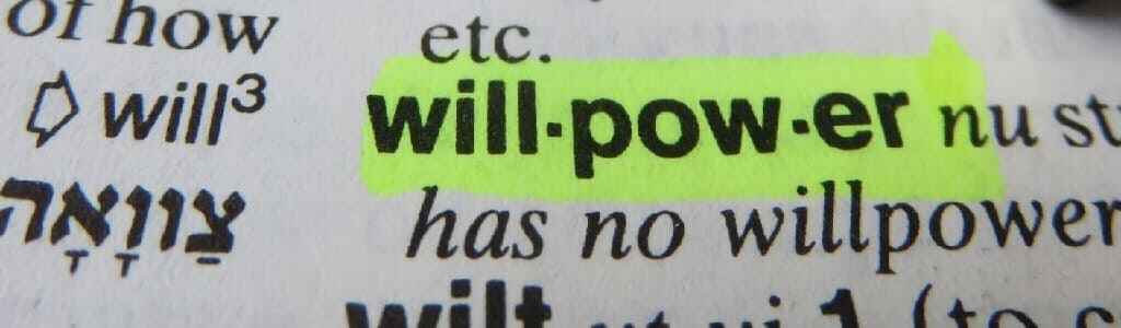 A dictionary excerpt highlighting the definition of the word "willpower," symbolizing the foundational strength needed for self-discipline and how to increase willpower with celestial intervention.